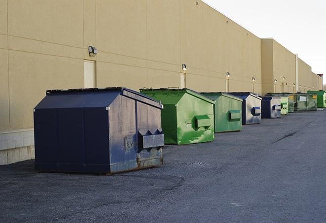 closed construction dumpster with a sign prohibiting unauthorized access in Alvada, OH